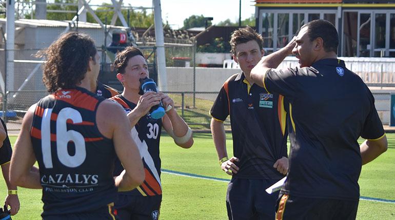 NT Thunder line coach talking to players