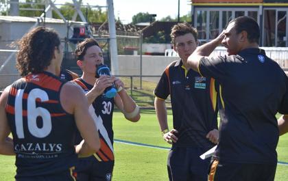 NT Thunder line coach talking to players