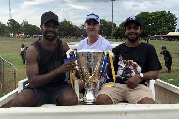 Willie Rioli with the AFL premiership cup